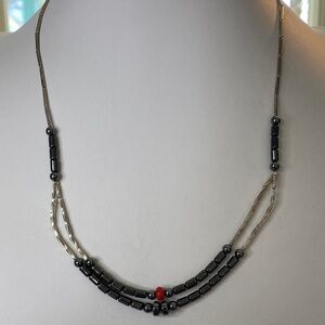 Liquid silver and Hematite Beaded Necklace with Red coral Accent